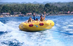 One Day Watersports Package Nusa Penida by Caspla Bali, Dounat Boat