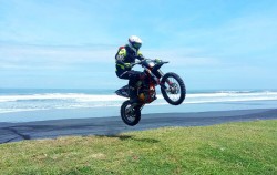 Jump at beach image, West Rubber Forest and Beach Dirt Bike, Bali Dirt Bike